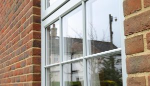 A white uPVC window with double glazing installed for energy efficiency