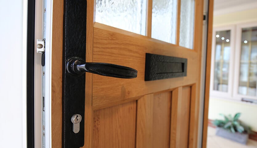 Golden oak uPVC front door close up