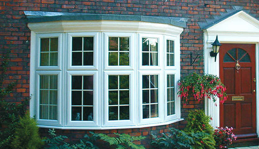 Large white uPVC bay window