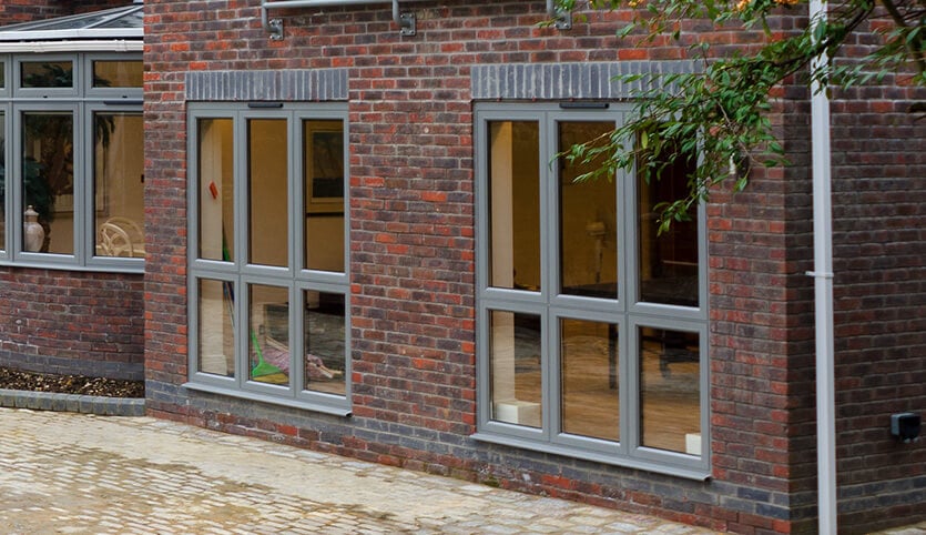 Grey aluminium casement windows