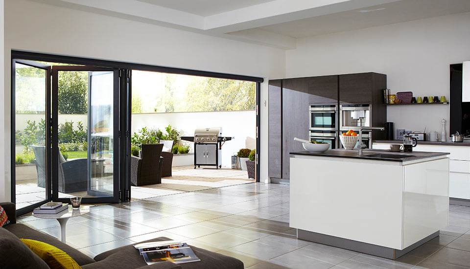 Black bi-fold doors in a modern kitchen