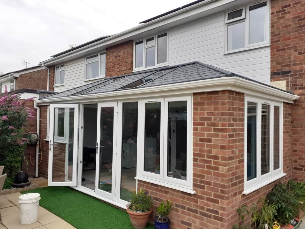 Orangery with white French doors