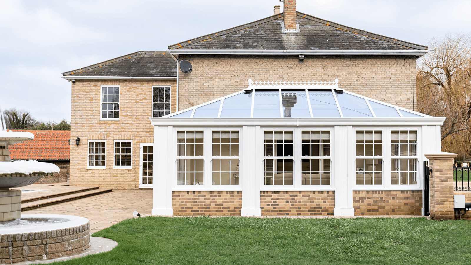 White Orangery with vertical sliding sash windows