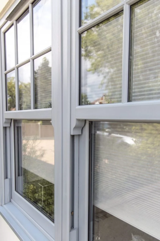 Grey vertical sliding windows