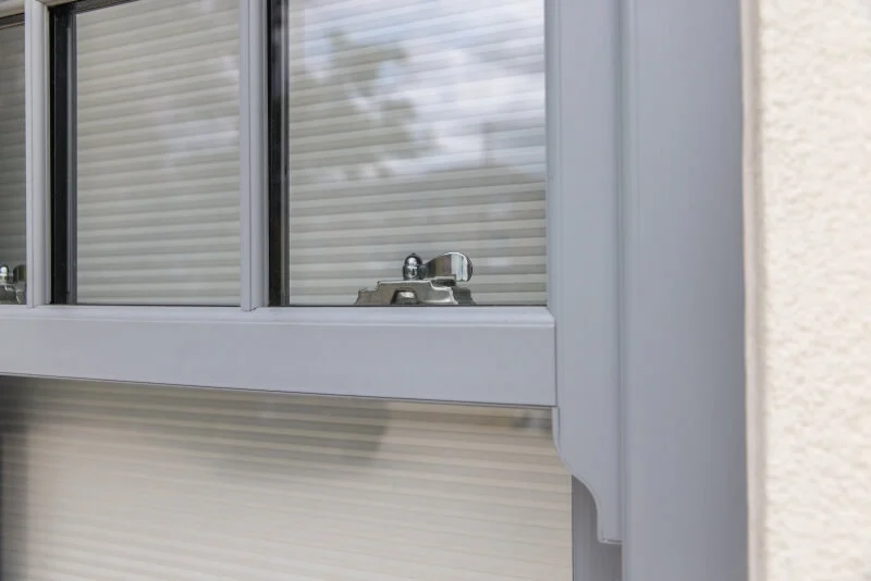 Grey vertical sliding windows
