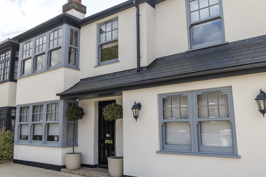 Grey vertical sliding windows